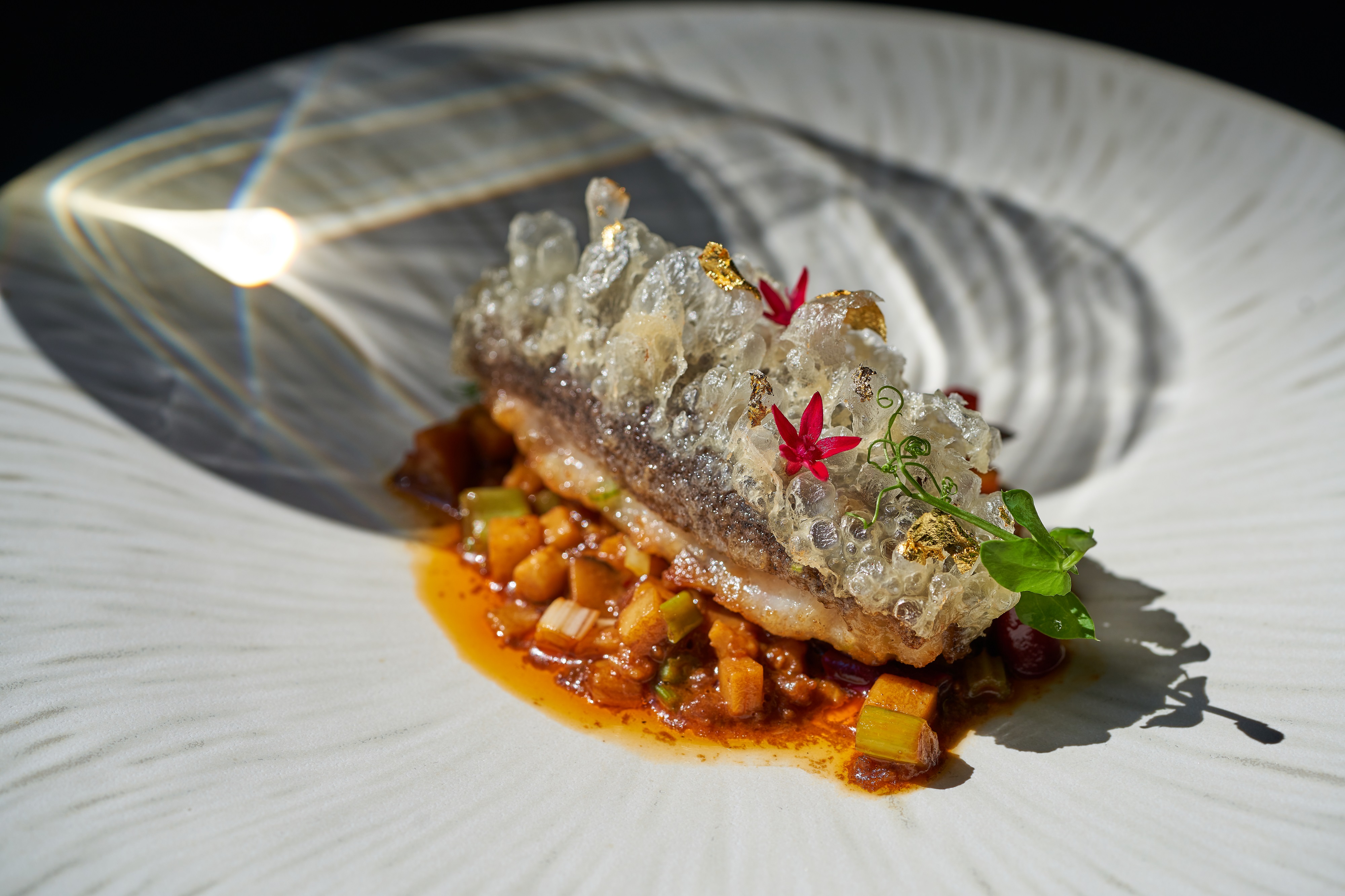 Chinese Library_龍皇披珍珠甲 Braised sea cucumber, celtuce and Nepal wild rock rice infused with chicken.jpg