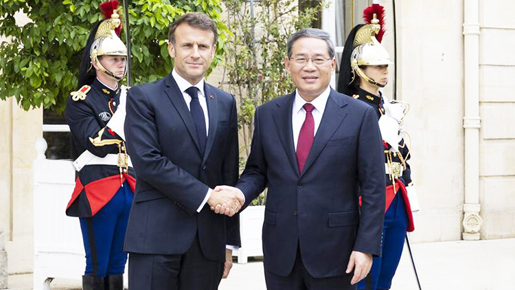李強會見法國總統馬克龍
